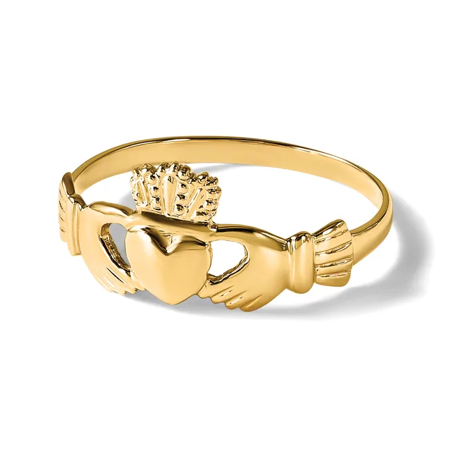 A gold Claddagh ring featuring two hands holding a heart topped with a crown, shown at an angle against a white background.
