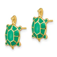 A pair of gold-toned turtle earrings with green enamel shells and clip-on closures.