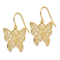 Pair of gold butterfly drop earrings with intricate filigree detailing on the wings, suspended from curved ear wires.