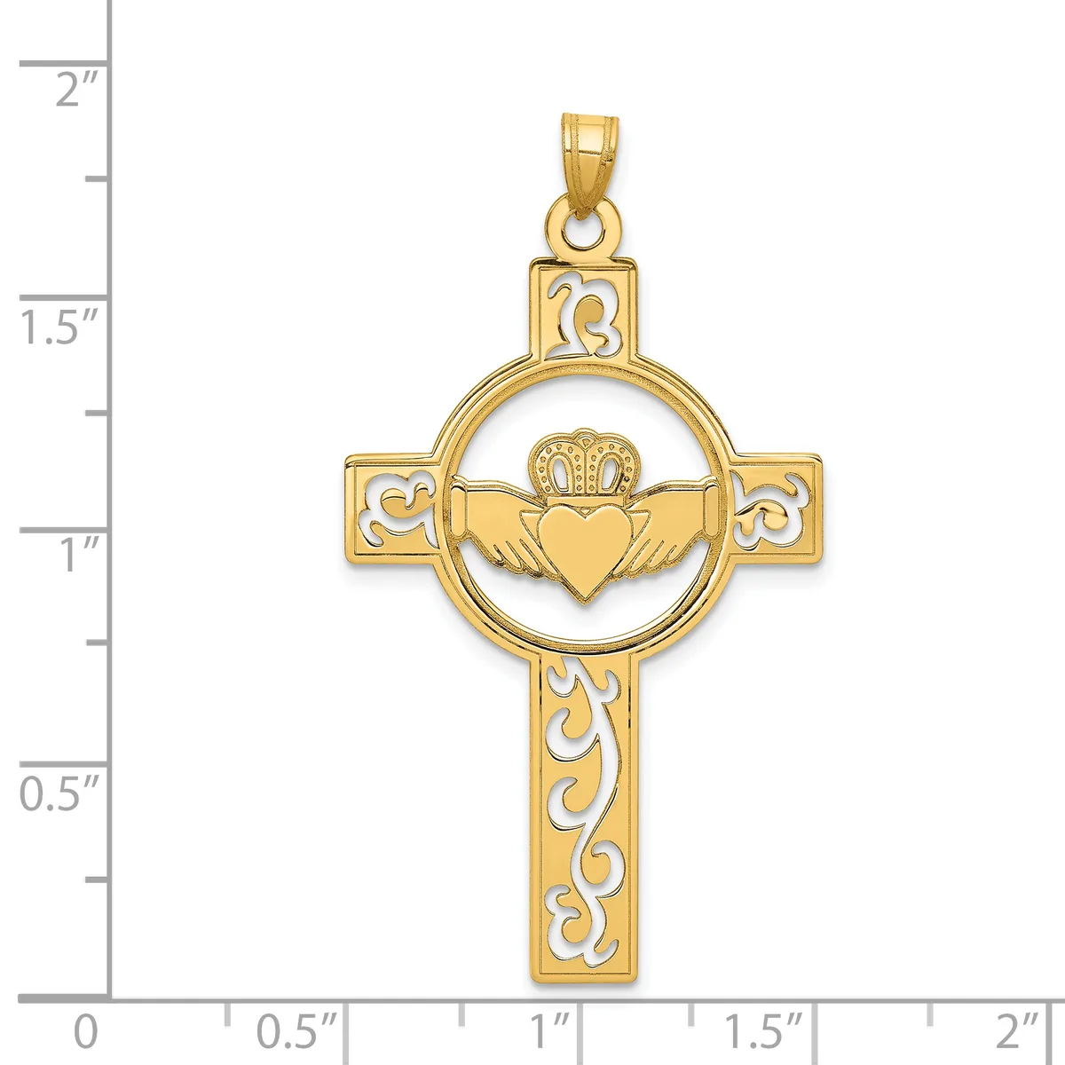 Gold-toned Claddagh cross pendant with a heart, crown, and wings in a circle at the center, decorative scrollwork on the cross arms, shown against a measurement scale.