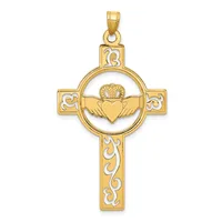 Gold cross pendant with decorative scrollwork featuring a Claddagh symbol (crowned heart with hands) in a circular center medallion.