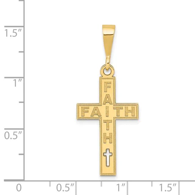 Gold cross pendant with "FAITH" engraved across the arms and a small cross at the bottom, shown next to a ruler measuring approximately 1.25 inches tall.