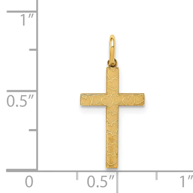Gold textured cross pendant with a polished finish shown next to a ruler measuring approximately 0.75 inches tall and 0.5 inches wide.