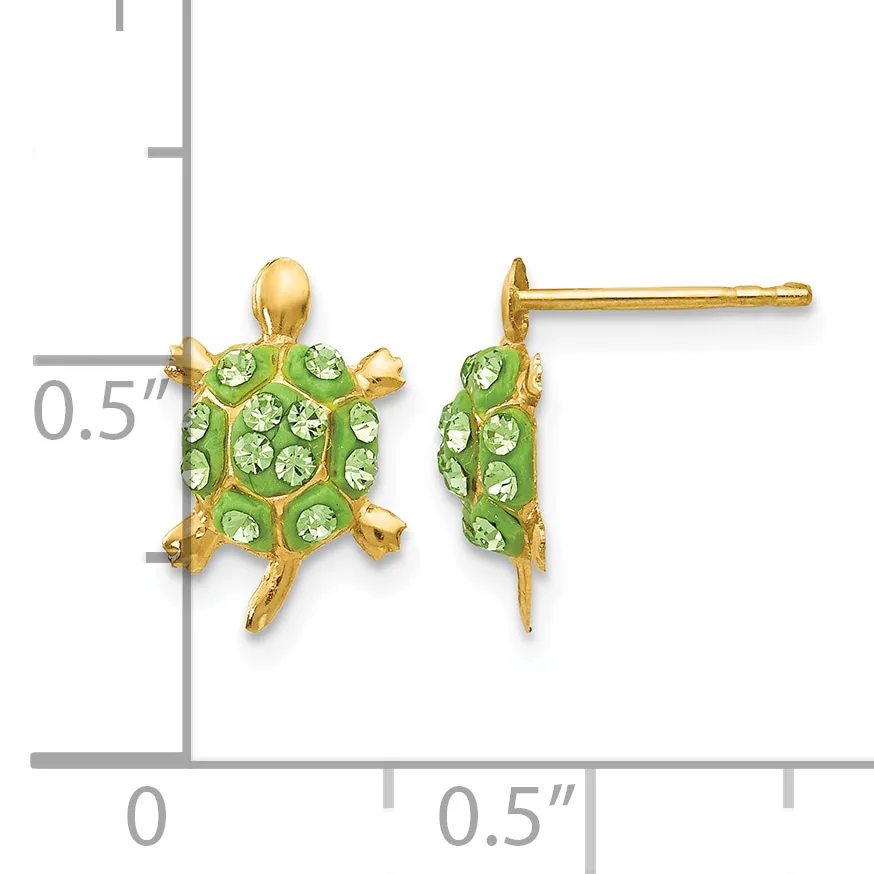 Gold-toned turtle stud earrings with green crystal embellishments shown next to a ruler indicating approximately 0.5 inches in length.