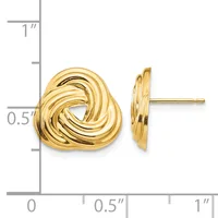 Gold-colored twisted knot stud earrings displayed next to a measurement ruler showing approximately half-inch diameter.