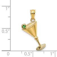 Gold cocktail glass charm pendant with green stone accent and detailed texturing, shown against a measurement scale.