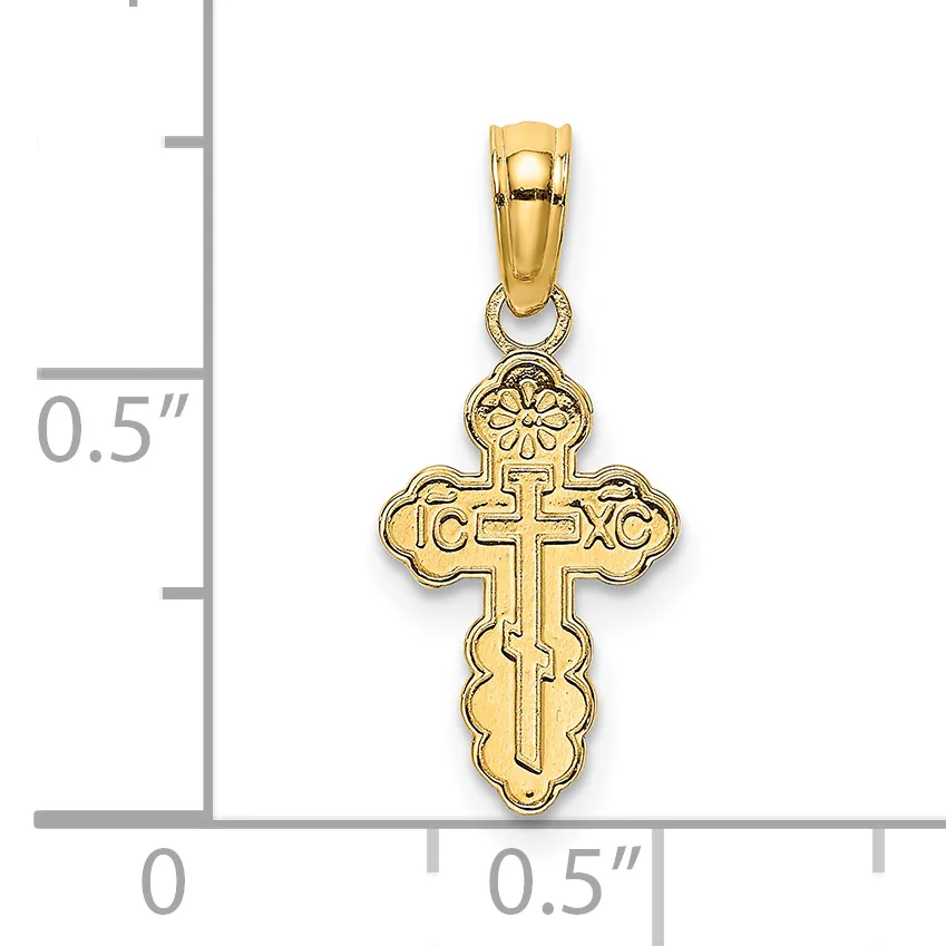Gold cross pendant with ornate looped ends and decorative scrollwork, shown next to a measurement scale indicating approximately 0.5 inches in width and height.