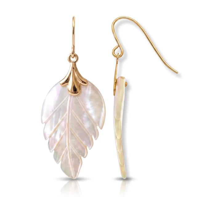 A pair of gold-toned fish hook earrings with carved mother-of-pearl leaf pendants, shown from the front and side, on a white background.