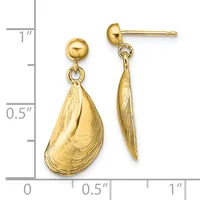 Pair of gold-toned dangle earrings with round posts and textured shell-shaped drops, displayed against a measurement scale.