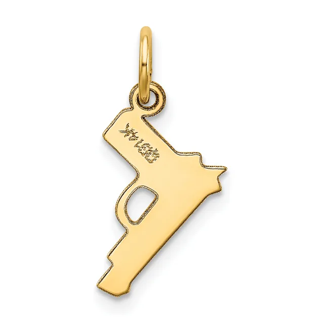 A gold-colored pistol-shaped pendant with a small hallmark stamped on the barrel, hanging from a gold bail loop.