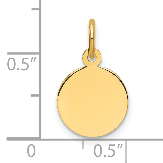 A polished gold circular disc pendant with a looped bail, shown next to a ruler indicating its width is approximately half an inch.