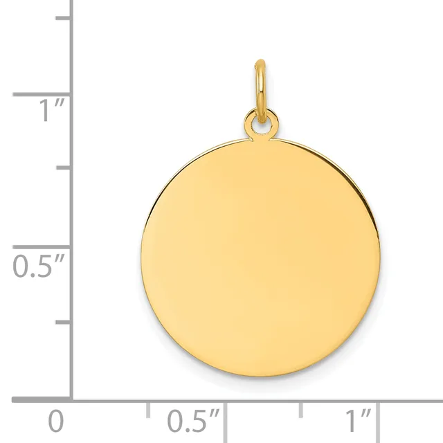 A polished gold circular pendant with a small loop at the top, shown against a measurement scale indicating approximately one inch in diameter.