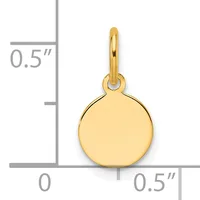 A polished yellow gold circular disc pendant with a loop bail, shown against a measurement scale indicating approximately half an inch in diameter.