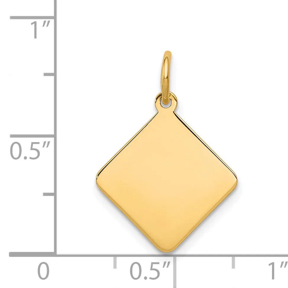 A polished gold diamond-shaped pendant with a small bail loop, shown next to a ruler indicating approximately 0.5 inches in width and height.