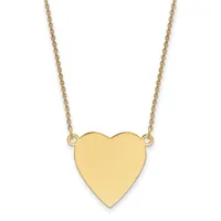 Gold-toned heart pendant hanging from a delicate gold chain against a white background.