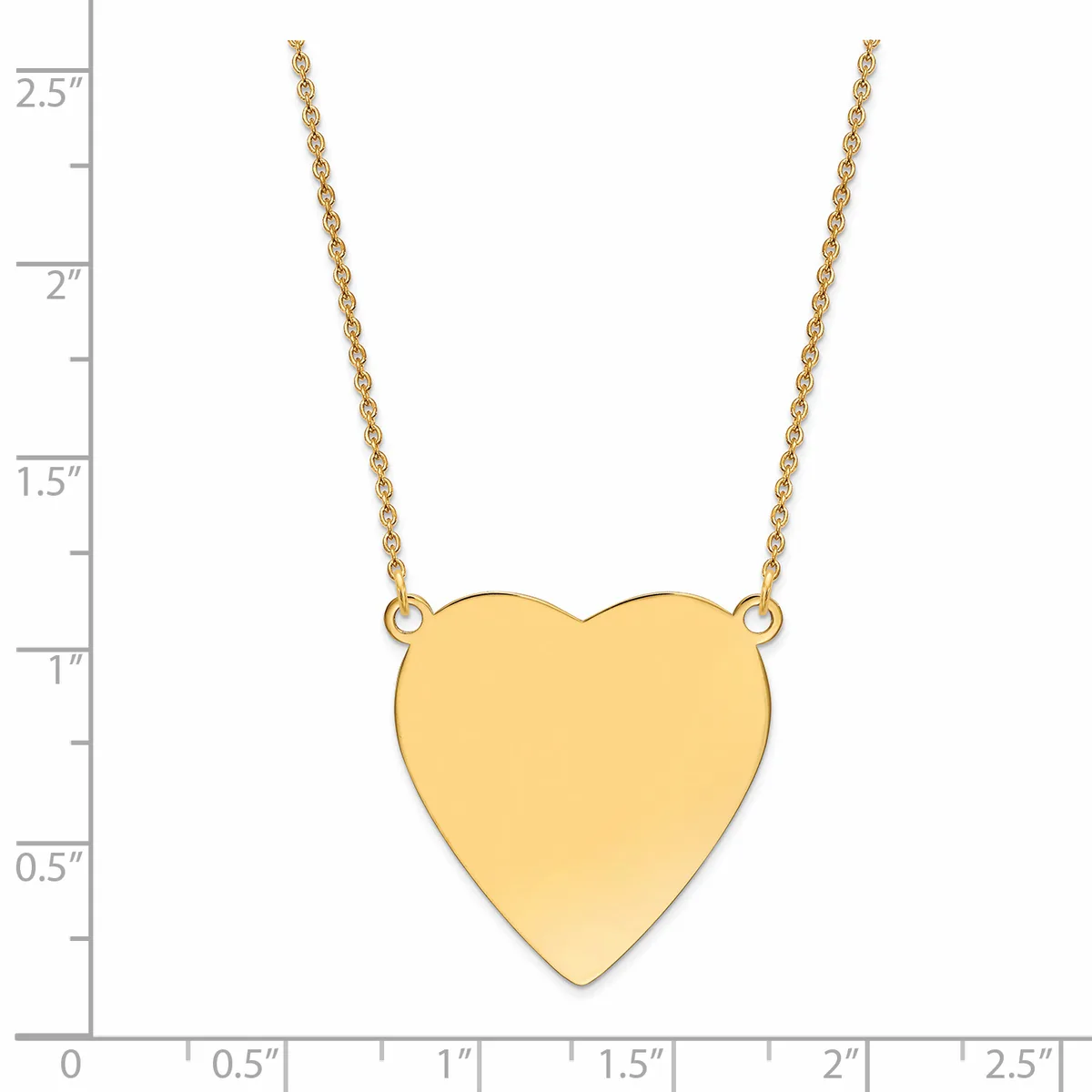 A gold heart pendant hangs from a delicate gold chain against a white background with a measurement scale on the left side.