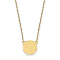 Gold chain necklace with a polished circular pendant hanging from two attachment points.