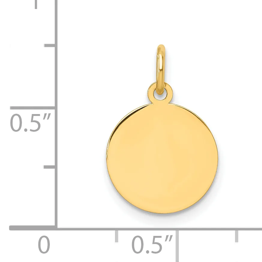 A polished gold circular disc pendant with a small loop at the top, shown next to a ruler indicating its size as approximately half an inch in diameter.