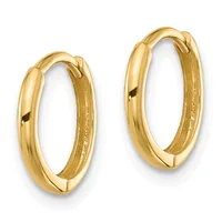 A pair of polished gold hoop earrings with a chunky rounded profile and hinged closures, displayed side by side against a white background.