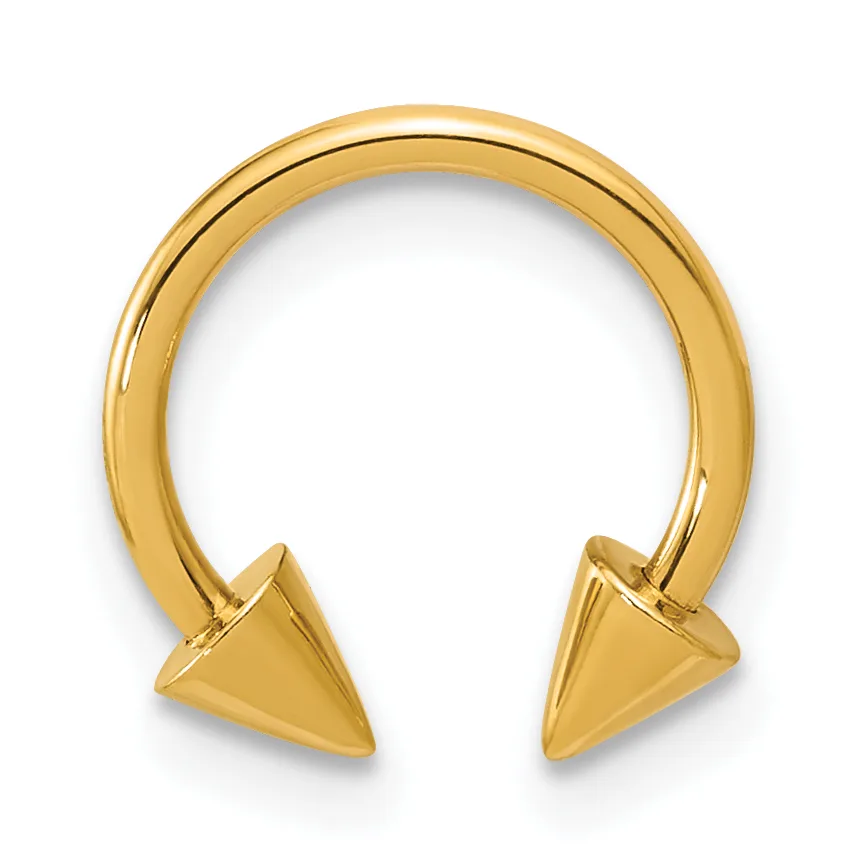 Gold-toned horseshoe-shaped bracelet with pointed cone-shaped terminals at each open end, displayed against a white background.