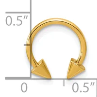 Gold-toned horseshoe-shaped bracelet with spiked cone ends, shown with measurement rulers indicating approximately 0.5 inches in height and width.