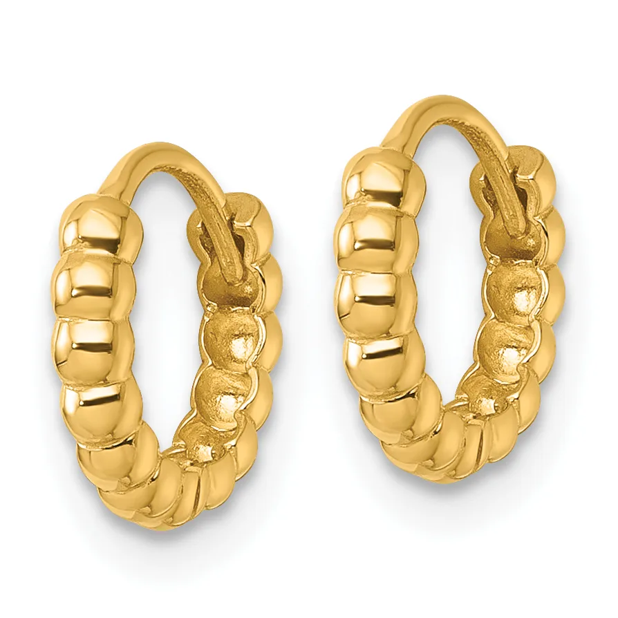 A pair of gold hoop earrings with a textured, segmented surface and polished finish, displayed against a white background.
