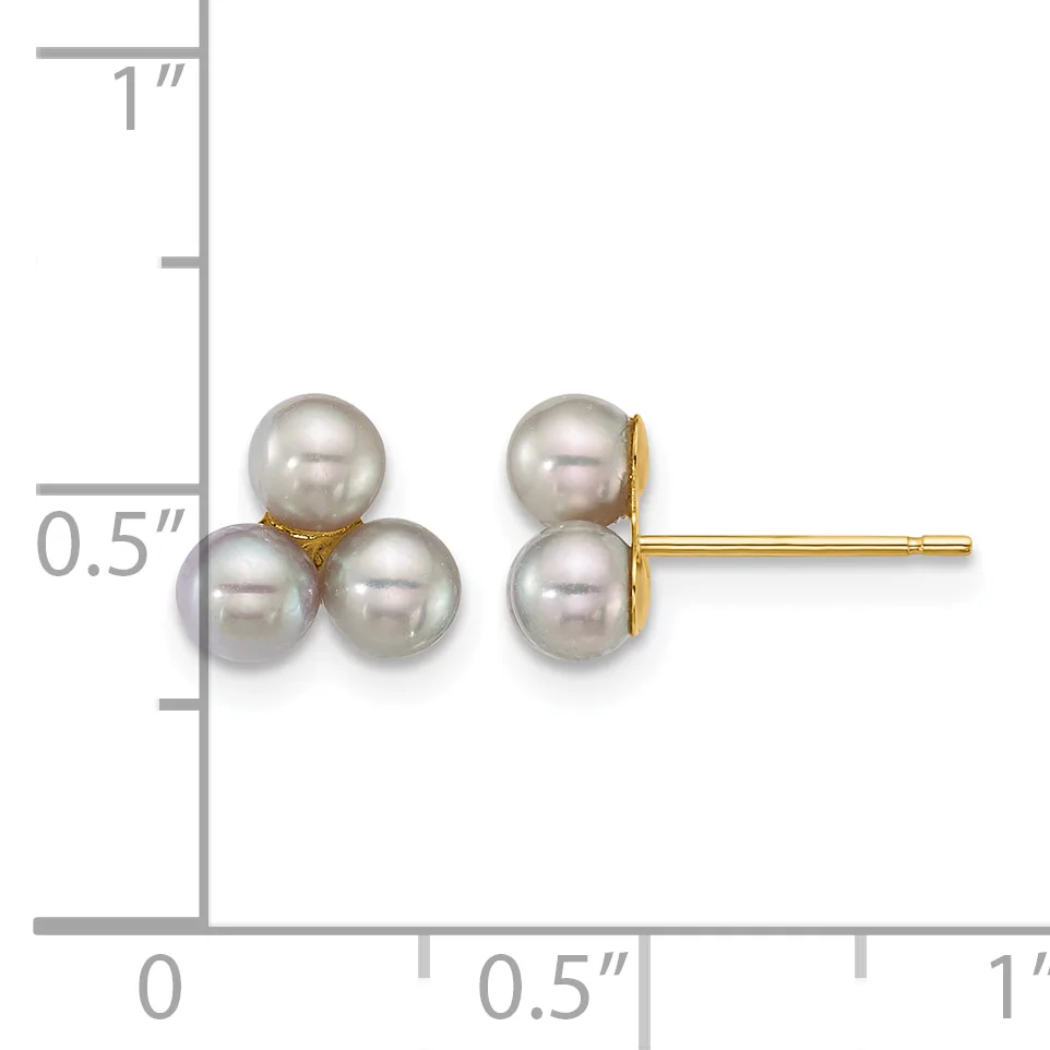 A pair of gray pearl stud earrings arranged in a three-pearl cluster formation with gold posts, displayed next to a ruler showing approximately 0.5 inches in height.