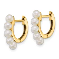 A pair of gold hoop earrings with white pearl beads arranged along the curved sides, shown from the front against a white background.