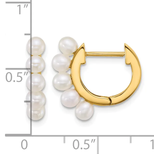 Gold-toned hoop earrings with white pearl accents arranged in a cluster on each side, shown next to a ruler indicating approximately one inch in length.