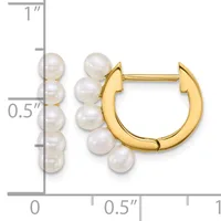 Gold-toned hoop earrings with white pearl accents arranged in a cluster on each side, shown next to a ruler indicating approximately one inch in length.