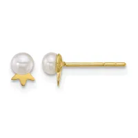 Pair of gold stud earrings featuring white pearl domes set above small four-pointed star shapes, shown from front and side views.