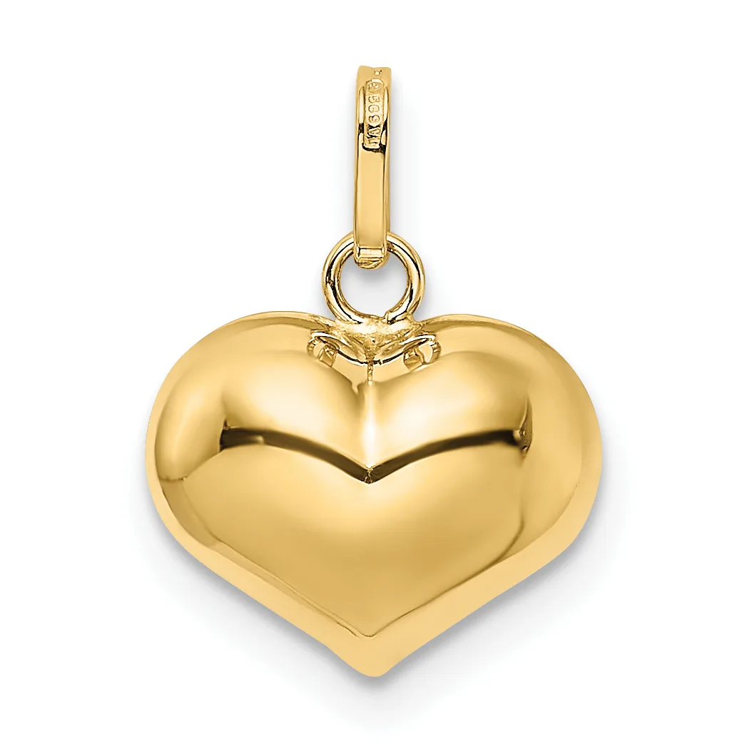 A polished gold heart-shaped pendant with a small hallmark on its bail, suspended from a gold loop and chain attachment.