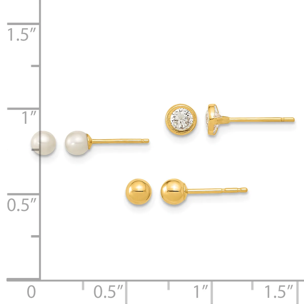 Three pairs of gold stud earrings displayed on a measurement scale: pearl studs, cubic zirconia studs, and polished ball studs.