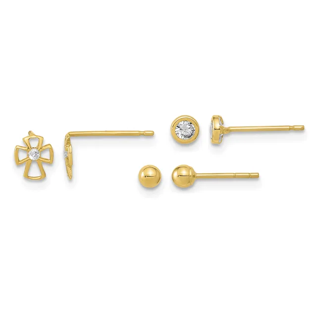Three pairs of gold stud earrings displayed in a row: a cross with a center diamond, a bezel-set round diamond, and a polished gold ball.