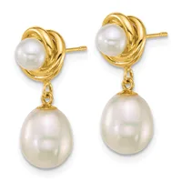 Pair of gold-toned drop earrings with twisted knot studs topped by smaller round pearls and larger teardrop pearls hanging below.