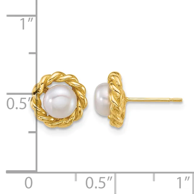 Pair of gold stud earrings with twisted gold bezels surrounding white pearl centers, shown at actual size on a measurement ruler.