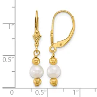 Pair of gold-toned leverback earrings with white pearl drops and small gold beads, displayed against a measurement ruler showing approximately one inch in length.