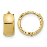 Pair of polished gold huggie hoop earrings shown from front and side views against a white background.