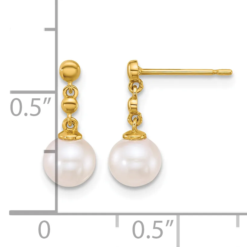 Pair of gold stud earrings with white pearl drops, shown next to a measurement scale indicating approximately 0.5 inches in length.