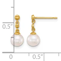 Pair of gold stud earrings with white pearl drops, shown next to a measurement scale indicating approximately 0.5 inches in length.