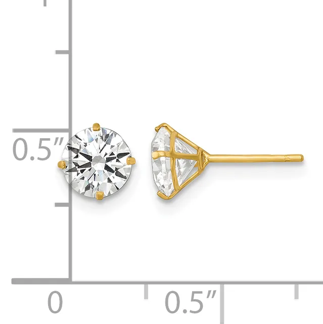 A pair of gold stud earrings with round brilliant-cut cubic zirconia stones, shown front and side view against a measurement scale indicating approximately 0.5 inches in diameter.