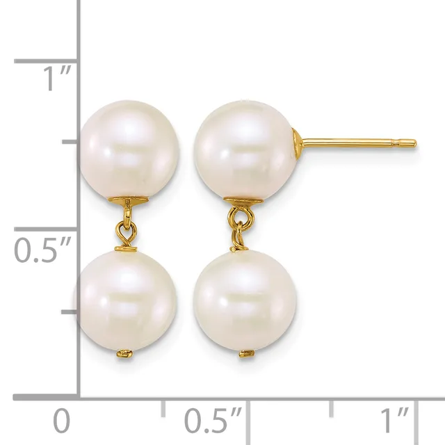 Pair of gold earrings with two white pearl drops suspended from studs, shown against a ruler measuring approximately one inch in length.