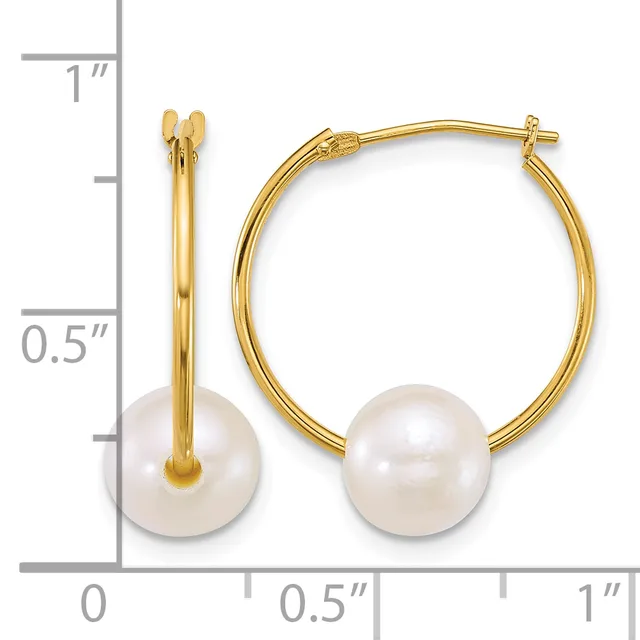 Gold hoop earrings with white pearl drops, shown next to a ruler indicating approximately one inch in length.