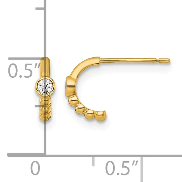 Gold hoop earrings with bezel-set round diamonds, shown on a measurement scale indicating approximately 0.5 inches in length.
