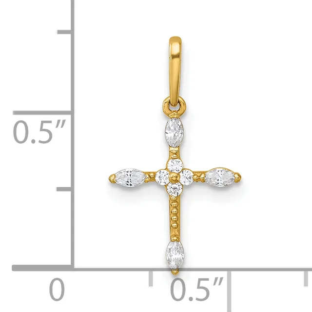 A gold cross pendant with marquise-cut cubic zirconia stones arranged in a cross pattern, shown next to a ruler indicating approximately half an inch in height.