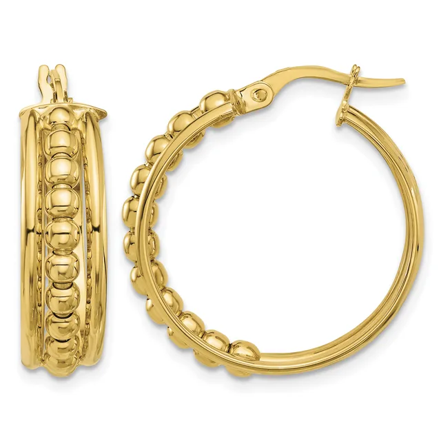 Pair of gold hoop earrings with textured ridged detailing on the outer surface and smooth inner curves, shown from front and side angles.
