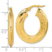 Pair of gold hoop earrings with textured diagonal stripe pattern, measuring approximately one inch in diameter with post and clutch closures.