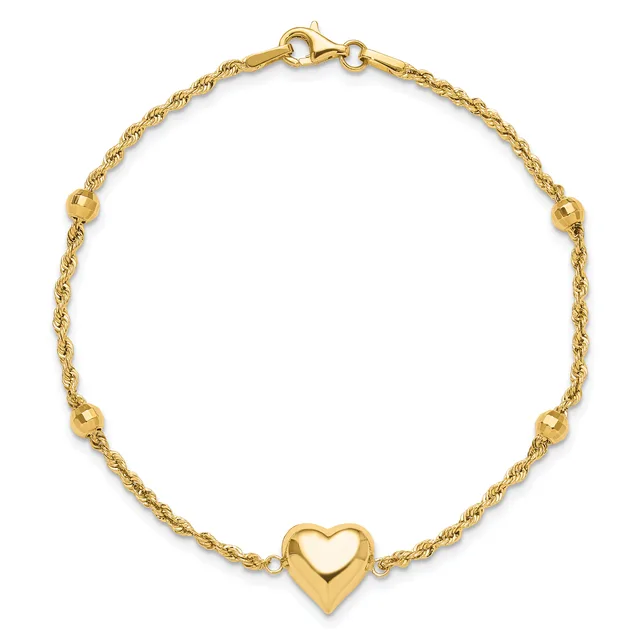 Gold-toned twisted chain bracelet with small spherical beads spaced throughout and a polished heart charm at the center, fastened with a lobster clasp.