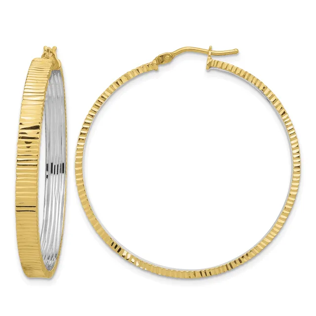 A pair of two-tone gold hoop earrings with textured ridged surfaces and white gold accents on the inner edges, shown from front and side views.