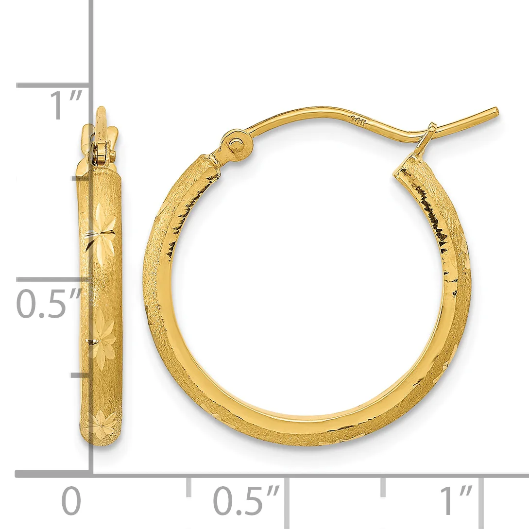 Pair of gold hoop earrings with textured surface and hinged posts, shown with measurement scale indicating approximately one inch in diameter.